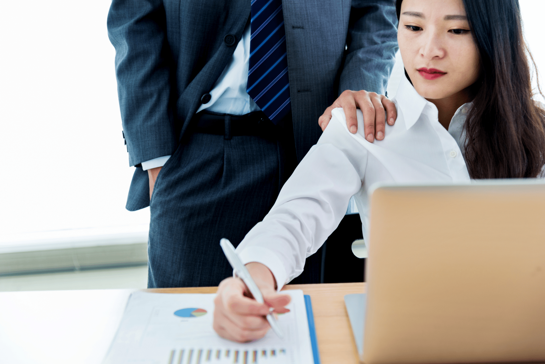 Man putting his hands on woman shoulder